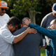 A group of men embrace in prayer outside the crime scene where the suspects in the shooting at the Inland Resource Center were killed Dec. 3, 2015, in San Bernardino, Calif.
Sean M. Haffey/Getty Images